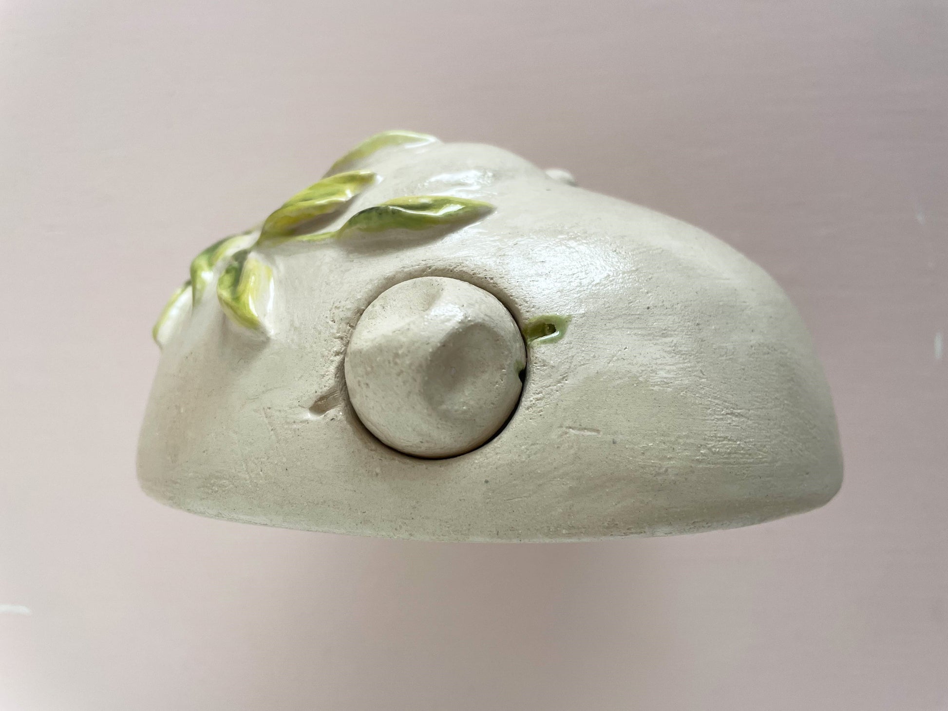 Close up picture. Sweet little baby  memorial urn in natural tones. Handcrafted with love.